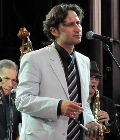 Raoul Bhaneja performing on Sept. 10, 2010 in Port Credit, Ontario with fellow Raoul and the Big Time members Terry Wilkins (bass) and Richard Underhill (sax)