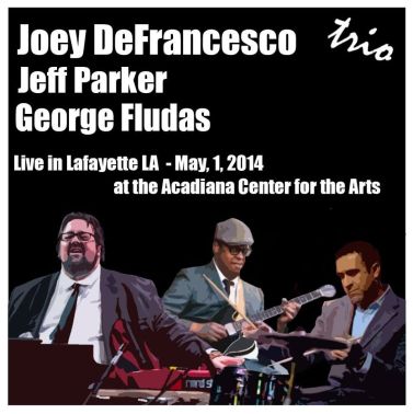 A concert poster featuring the Joey DeFrancesco Trio (L to R) DeFrancesco, Jeff Parker (guitar) and George Fludas (drums).