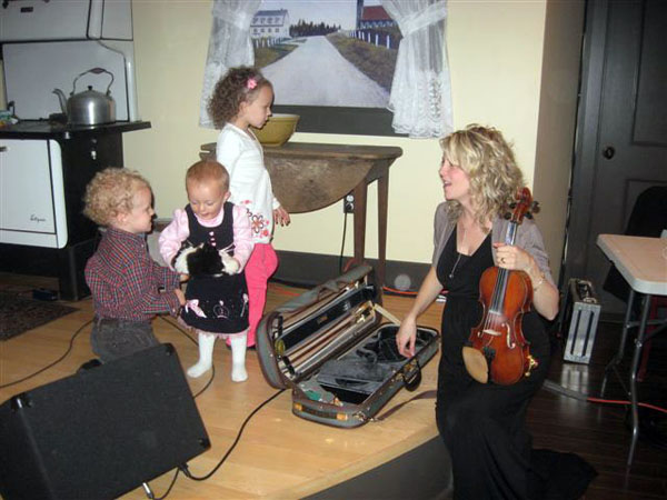 Natalie MacMaster in Nova Scotia in 2010 with her three eldest children (Mary Frances, Michael and Clare) during the launch of her book "Celtic Aire," a photographic tribute to Cape Breton (photo by Kimberley, courtesy of nataliemacmaster.com)