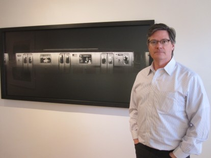 Stephen Bulger posing beside "Stainless 7492," New York, 2010, by Adam Magyar (© Adam Magyar, Stephen Bulger Gallery) [photo by Anita Malhotra]