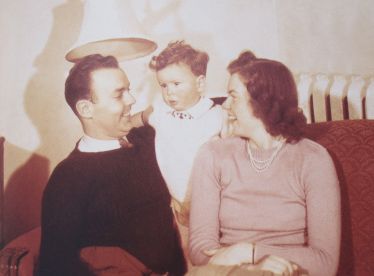 Bruce in 1947 as a toddler with his parents in Kingston, Ontario (photo courtesy of Bernie Finkelstein and Bruce Cockburn)