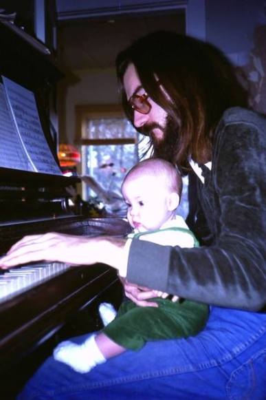 Emilie-Claire Barlow as a baby at the piano with her musician father, Brian Barlow (photo courtesy of Emilie-Claire Barlow)