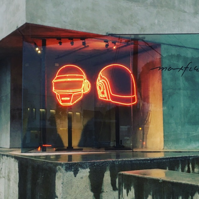 Neon helmet signs created by Lisa Schulte and her company Nights of Neon for a Daft Punk pop-up store at Maxfield's in February 2017 (photo courtesy of Lisa Schulte)