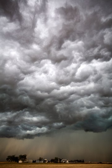 The Big Cloud: Each Year We Pray (photo © Camille Seaman)